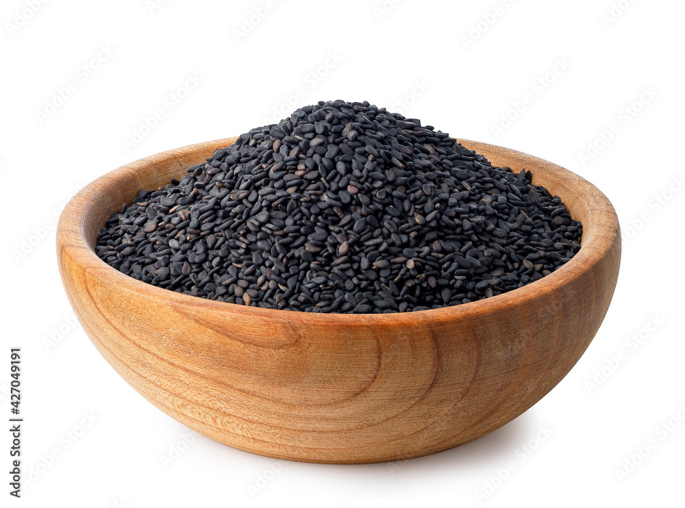 black sesame seeds in wooden bowl isolated black sesame seeds in wooden bowl isolated