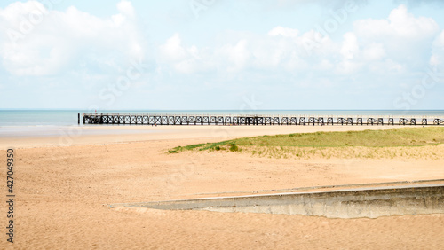 Scenic view on the beach and the pier