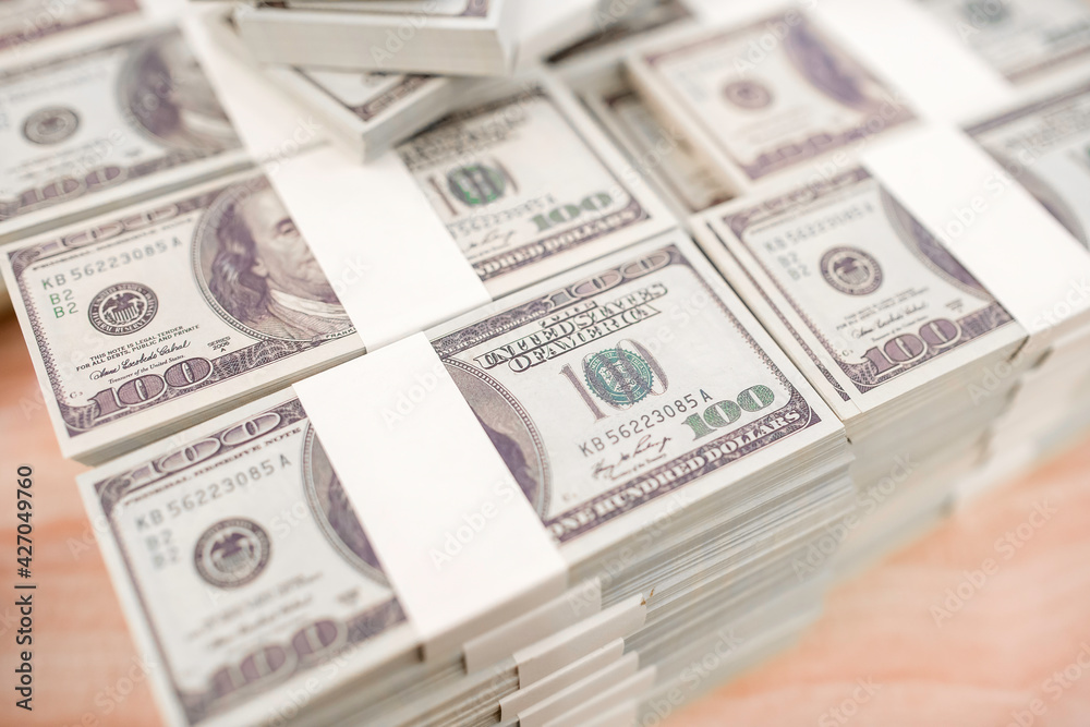 American Dollars Cash Money. One Hundred Dollar Banknotes. Stack of one hundred dollar bills .shallow focus effect. American Dollars Cash Money. One Hundred Dollar Banknotes. Stack of one hundred dollar bills .shallow focus effect.