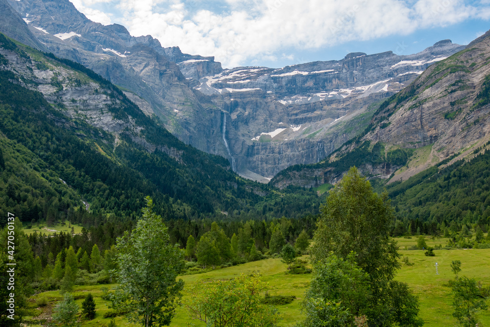Summer view of the Cirque du Gavernie. The Cirque de Gavarnie is a cirque in the central Pyrenees, in Southwestern France, close to the border of Spain.