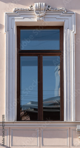 Windows on old city facades  with decorative elements