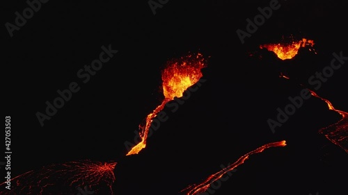 A volcano in the Reykjanes peninsula in Iceland. The eruption site consists of several craters in an enclosed valley where the largest vent is roughly 100 meter high. photo