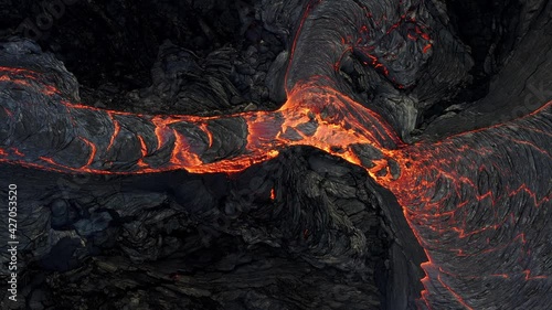 A volcano in the Reykjanes peninsula in Iceland. The eruption site consists of several craters in an enclosed valley where the largest vent is roughly 100 meter high. photo