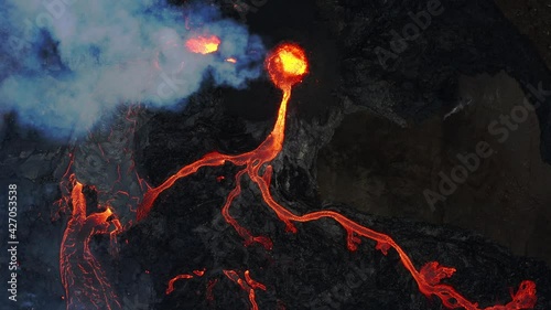 A volcano in the Reykjanes peninsula in Iceland. The eruption site consists of several craters in an enclosed valley where the largest vent is roughly 100 meter high. photo