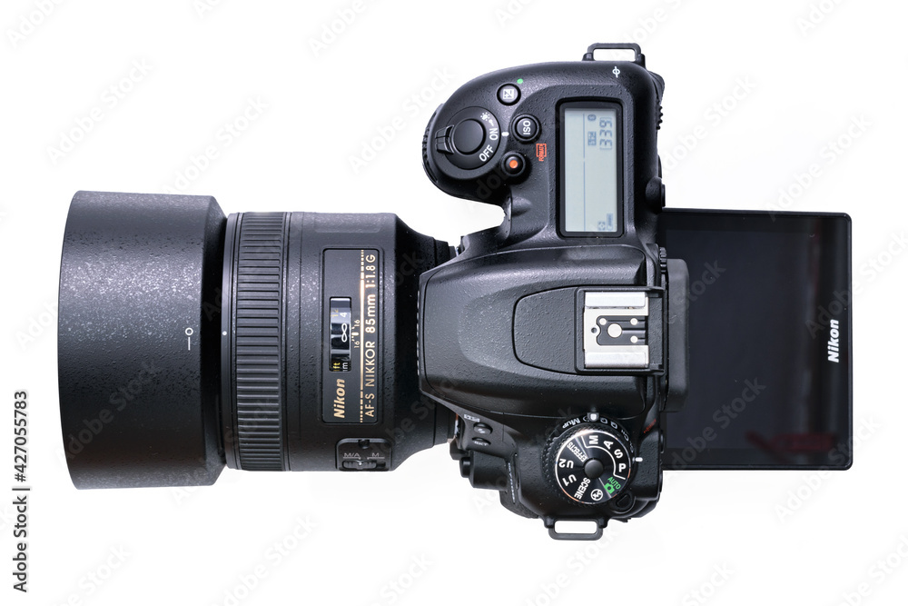 Krakow, Poland - April 09, 2021: Top view of Nikon D7500 DSLR camera with  Nikkor 85mm F1,