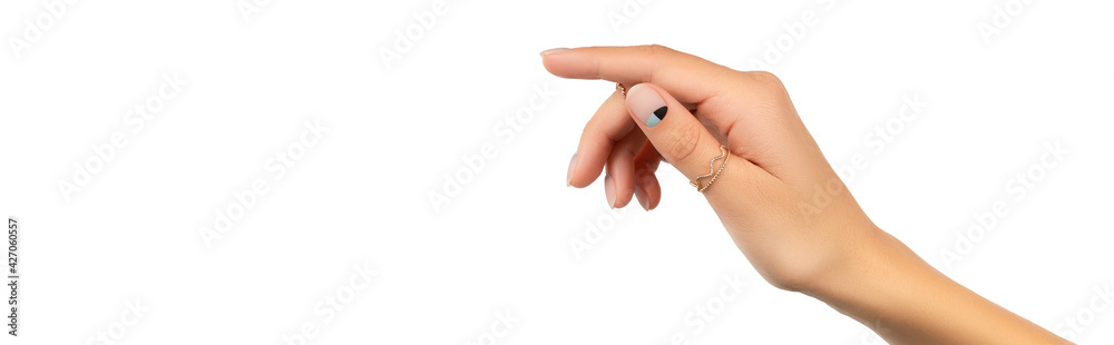 Young adult womans hand with fashionable nails on white background Young adult womans hand with fashionable nails on white background