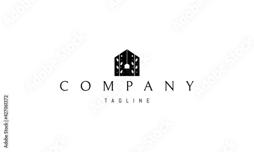 Vector logo on which an abstract image of a house that also looks like a tea bag.