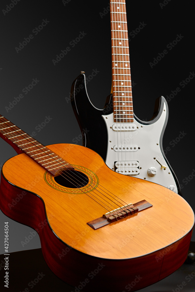 Fototapeta premium Modern electric and retro acoustic guitars