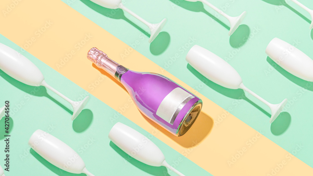 Creative party table pattern with purple champagne bottle and white glasses on  mint green and peach puff geometric background.