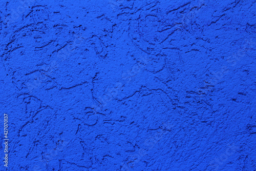 Background from a painted blue wall. Abstract blue background