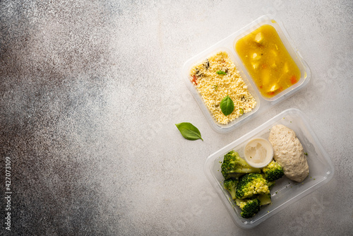 Weight loss diet balanced with fresh organic meal by delivery service of containers with healthy food, daily lunch box ready menu plan concept. Flat lay top view.