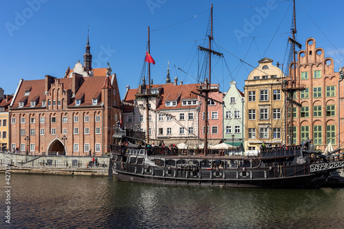 assenger harbor on the Motława River - a replica of a galleon as a cruise ship at Dlugie Pobrzeze in old town of Gdansk