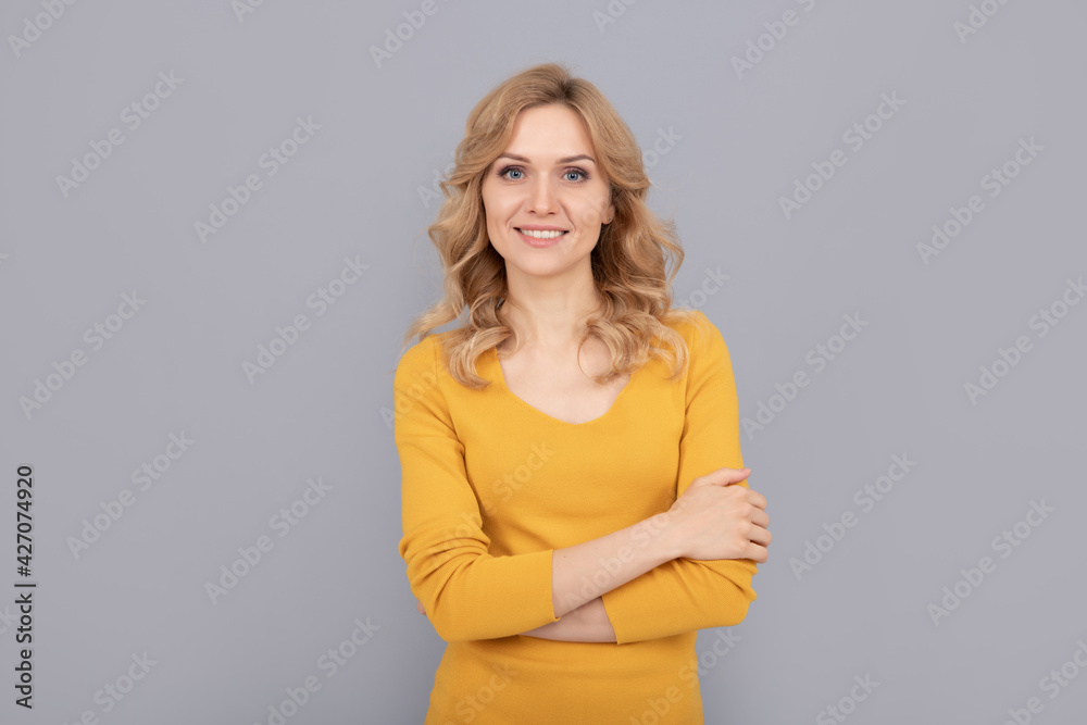 Fototapeta premium cheerful blonde beauty girl with curly hair, smooth skin