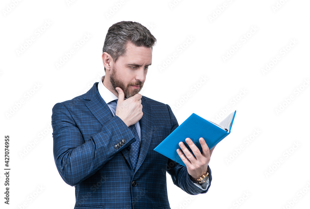 let me think. handsome man planning his work. boss examine business report let me think. handsome man planning his work. boss examine business report