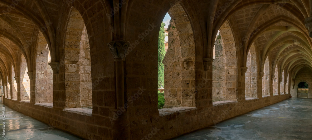 SPAIN, ZARAGOZA, MONASTERIO DE PIEDRA, APRIL 3, 2021; panoramic view of the corridors with the Gothic style stone arches inside the stone monastery.