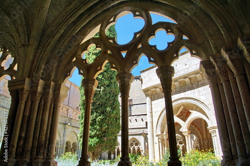 Detail of the cloister of Santa Maria de Poblet Monastery, Unesco heritage. Romanesque cloister architecture in Poblet, Spain. photo