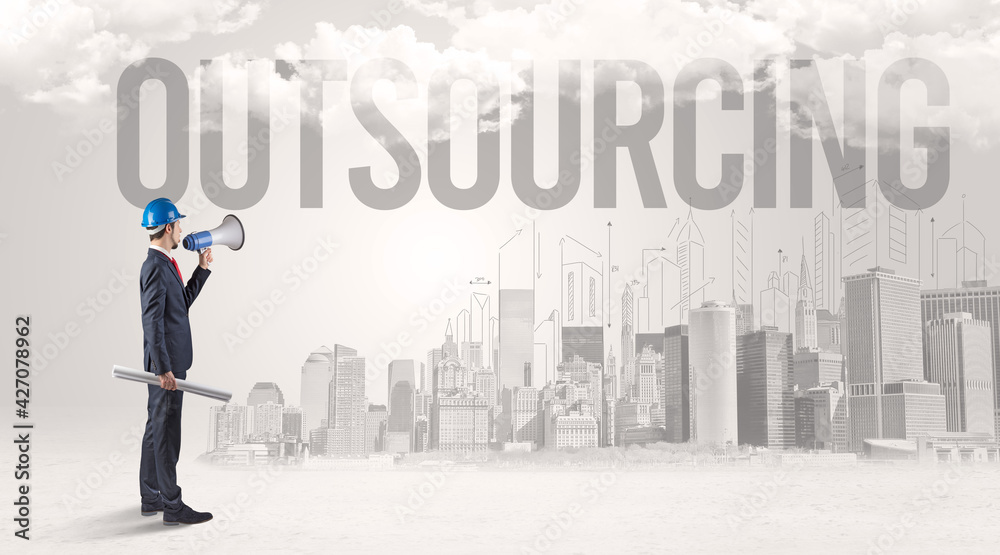 Young businessman with hard hat