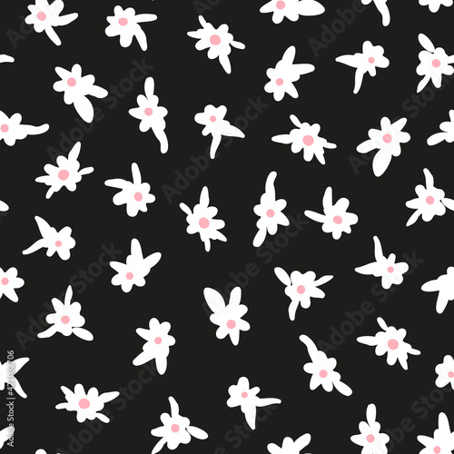 Random placed ditsy daisy seamless repeat pattern. Vector floral elements all over print with black background.