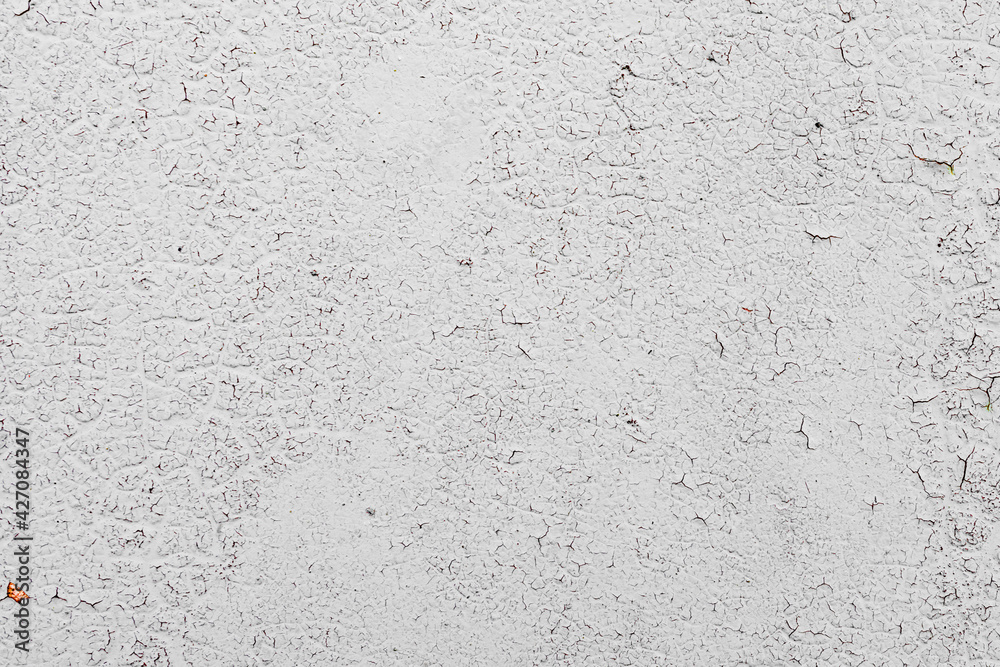 Metal texture with scratches and cracks which can be used as a background Metal texture with scratches and cracks which can be used as a background