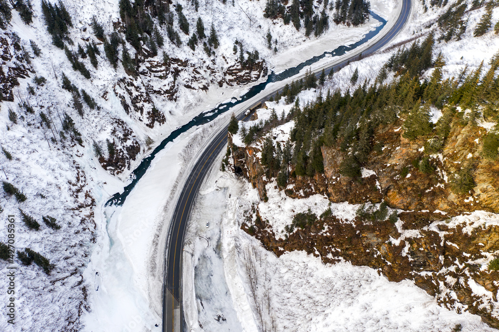 Aerial view of the Richardson Highway, Keystone Canyon, and Lowe River near Valdez, Alaska during the winter.