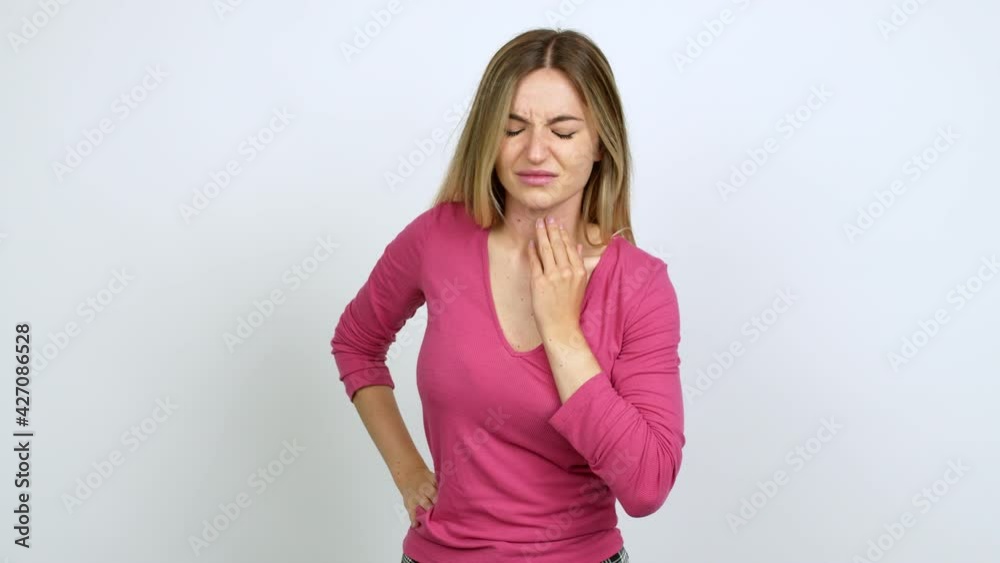 Young woman with sore throat over isolated background Young woman with sore throat over isolated background