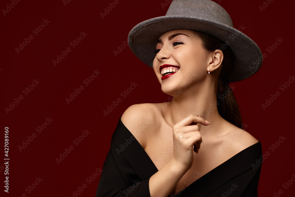 portrait of fashionable beautiful girl on red bakground. portrait of fashionable beautiful girl on red bakground.