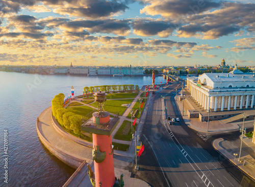 Sights Saint Petersburg. City in Russia. Spit of Vasilyevsky Island. Rostral columns in St. Petersburg. Landscape of Russian city. Stock exchange building in Saint Petersburg. Tour Russian Federation photo