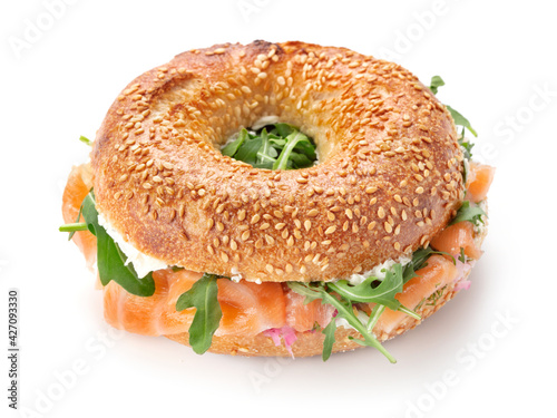 Tableau sur toile single whole bagel sandwich with salmon isolated on white background