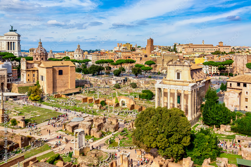 Panoramic cityscape view of the Roman Forum and Roman Altar of the Fatherland in Rome, Italy. World famous landmarks in Italy during summer sunny day