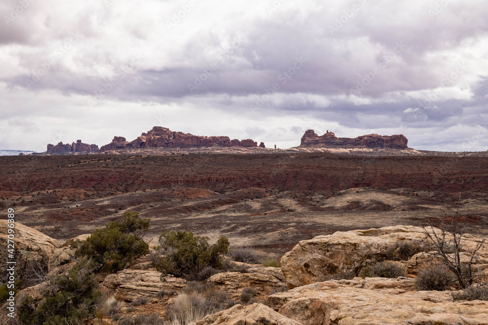 Distant mesas across a rocky landscape.