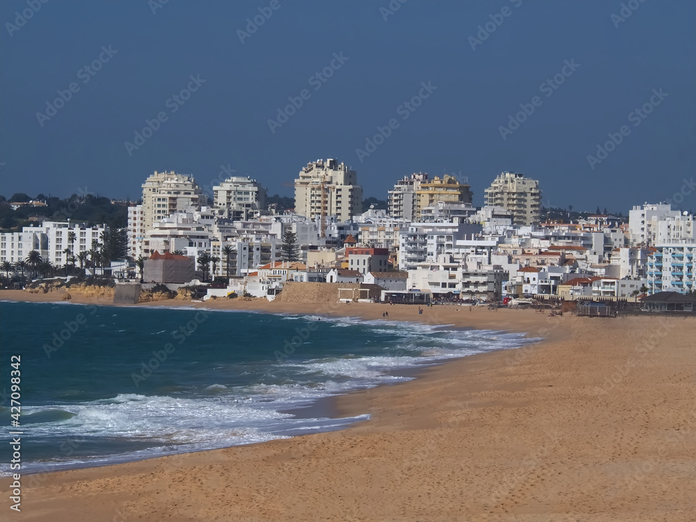 Beuatiful skyline of Armacaou de Pera with dunes in Portugal Beuatiful skyline of Armacaou de Pera with dunes in Portugal
