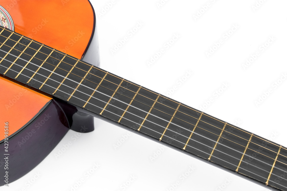 Fototapeta premium Classical guitar close up isolated on white background with space