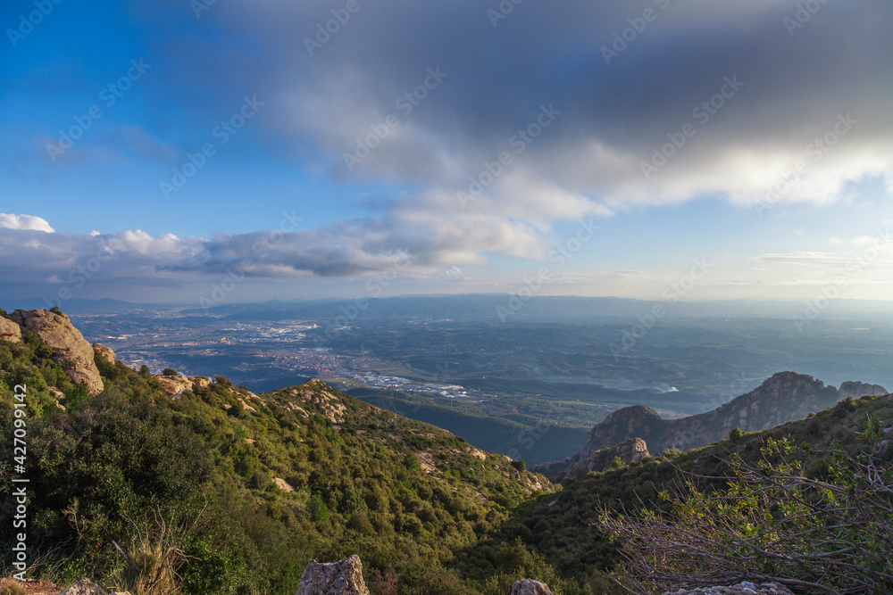 Spectacular scenery with mountains. Santa Maria de Montserrat..View from Montserrat Mountain. Montserrat Monastery, Catalonia, Spain.