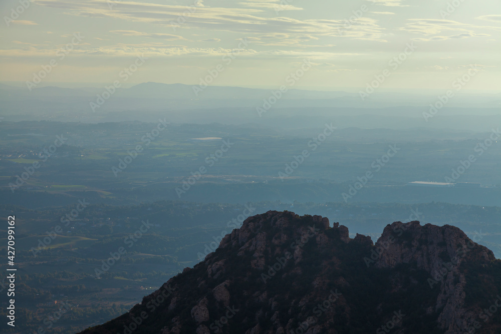 Spectacular scenery with mountains. Santa Maria de Montserrat..View from Montserrat Mountain. Montserrat Monastery, Catalonia, Spain. Spectacular scenery with mountains. Santa Maria de Montserrat..View from Montserrat Mountain. Montserrat Monastery, Catalonia, Spain.