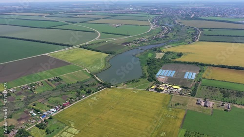 Panoramic view of a rural settlement in the fields Agricultural fields