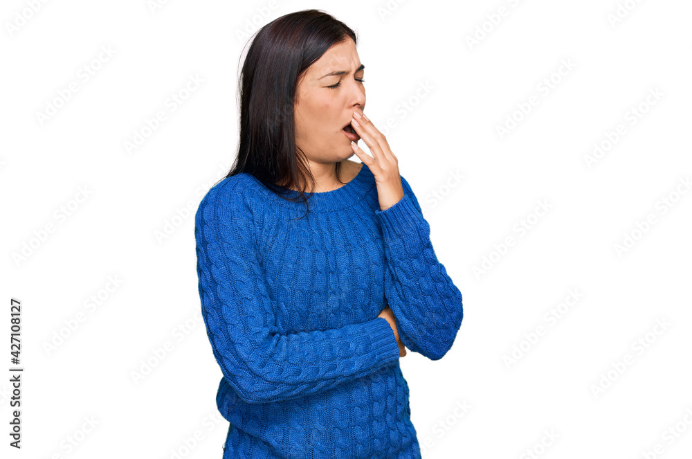 Young hispanic woman wearing casual clothes bored yawning tired covering mouth with hand. restless and sleepiness. Young hispanic woman wearing casual clothes bored yawning tired covering mouth with hand. restless and sleepiness.