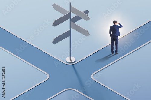 Businessman at the crossroads choosing strategy