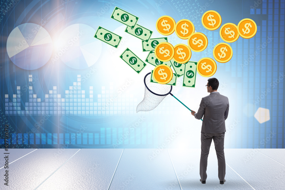 Businessman catching money with landing net Businessman catching money with landing net
