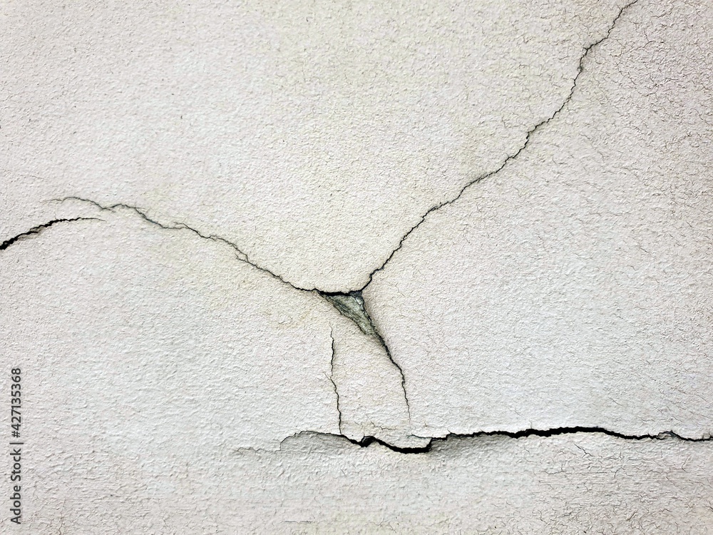 Obraz premium cracked paint on the wall. abstract background texture