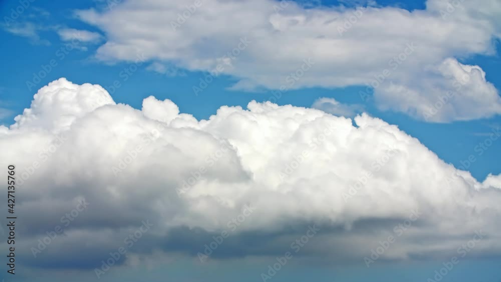 Constantly rolling cumulus clouds in blue sky, time-lapse Constantly rolling cumulus clouds in blue sky, time-lapse