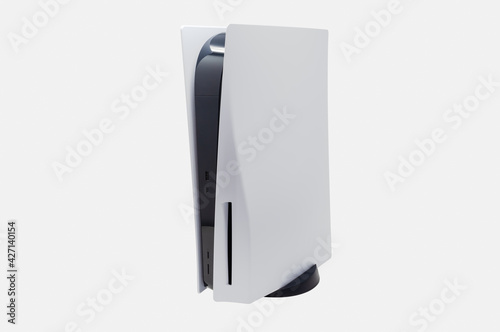 Next gen video game console with white colored plates and black body. photo