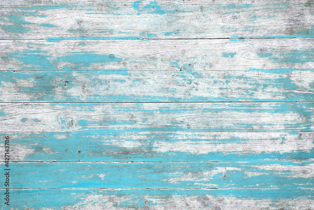 Obraz premium Weathered blue painted wooden wall. Vintage blue wood plank background. Old blue wooden wall coming from beach.
