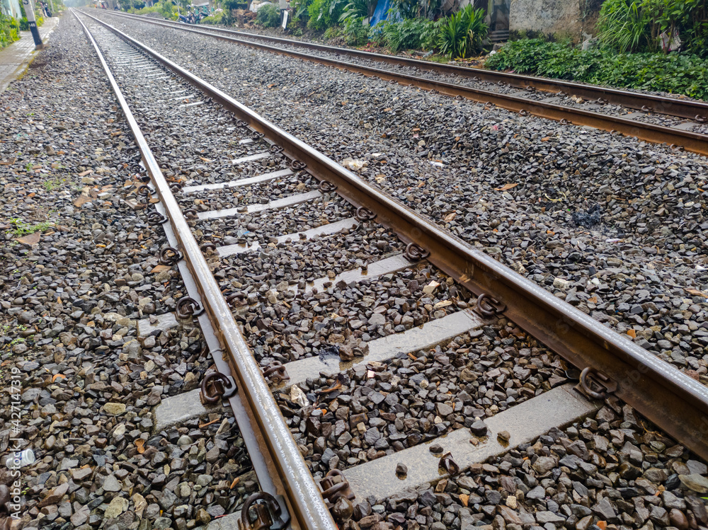 Railroad tracks shoot after rain. Leading line view Railroad tracks shoot after rain. Leading line view