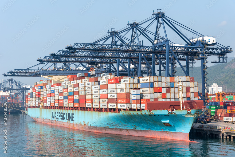 Cargo container ship "Maersk Stepnica", owned by Maersk, berthed in port of  Yantian. She is fully loaded with cargo inside containers, gantry cranes in  operation. Photos | Adobe Stock