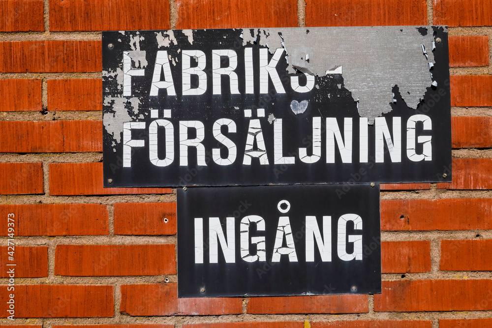 Stockholm, Sweden An old and generic sign in Swedish saying factory outlet and entrance. Stockholm, Sweden An old and generic sign in Swedish saying factory outlet and entrance.