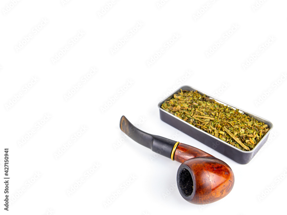 Tobacco pipe and snuff box on a white background. Wooden pipe for