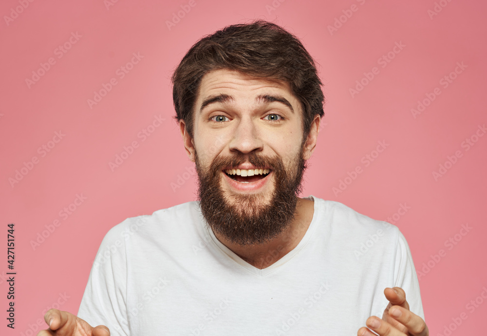 Portrait of happy man with bushy beard emotions model pink background Portrait of happy man with bushy beard emotions model pink background