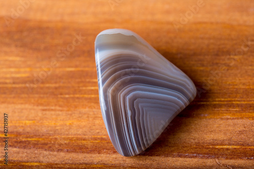 gray agate on a wooden table photo