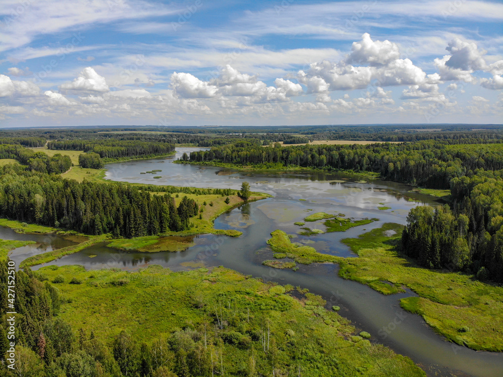 Aerial view of the pond into which the Ryabovka and Kordyaga rivers flow (Ryabovo, Kirov region, Russia)
