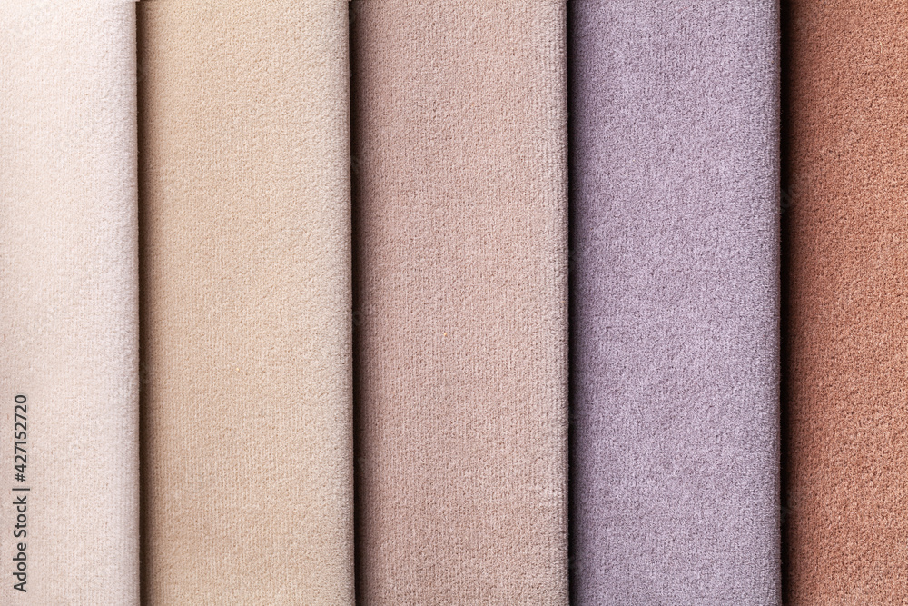 Fototapeta premium Sample of velvet textile brown and beige colors, background. Catalog and palette tone of Interior fabric for furniture